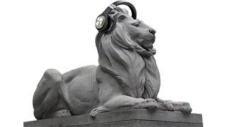 A statue of a line with headphones